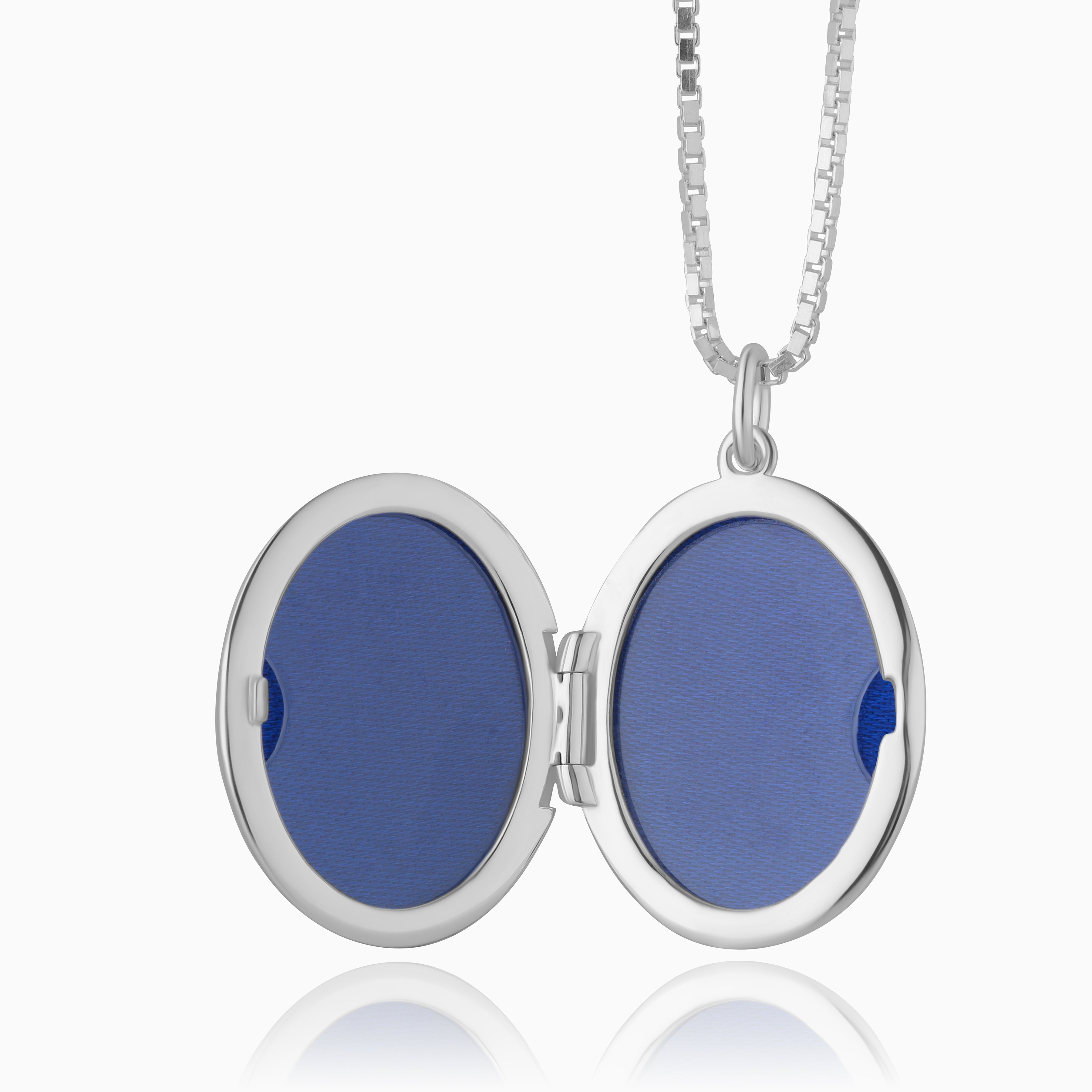Close up photo of the inside of a 925 sterling silver oval locket.