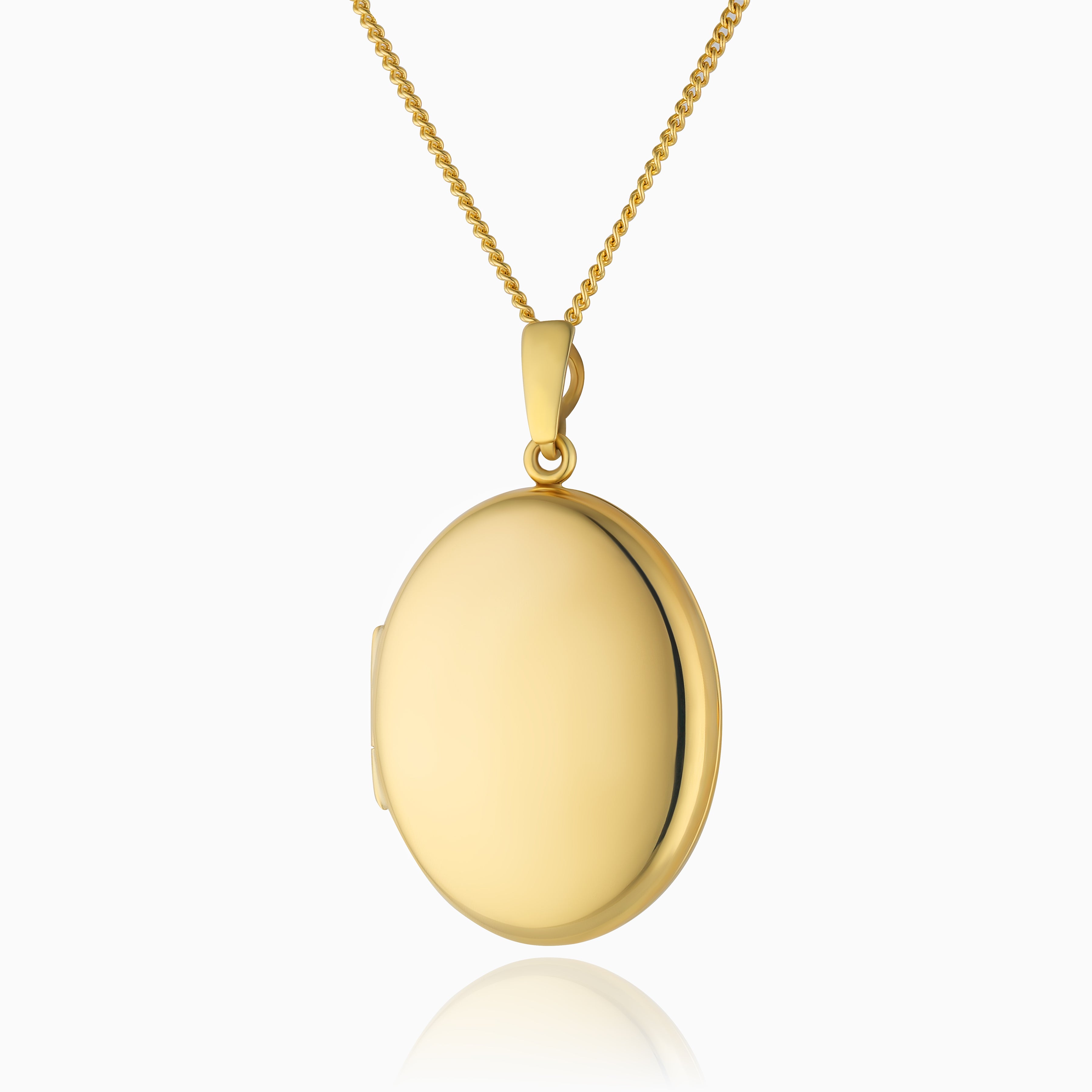 A 9ct plain gold oval Locket on a 9ct gold curb chain