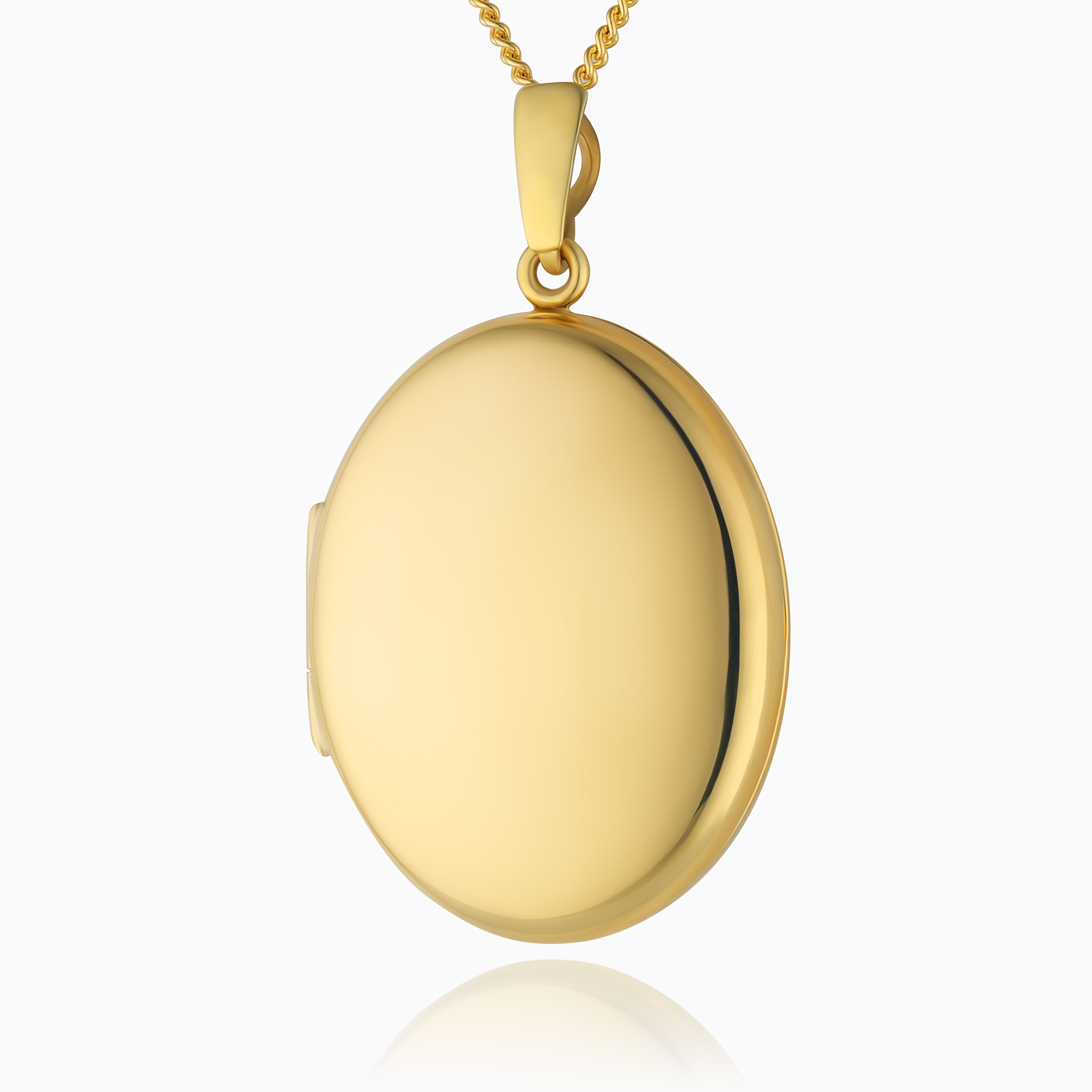 A 9ct plain gold oval Locket on a 9ct gold curb chain