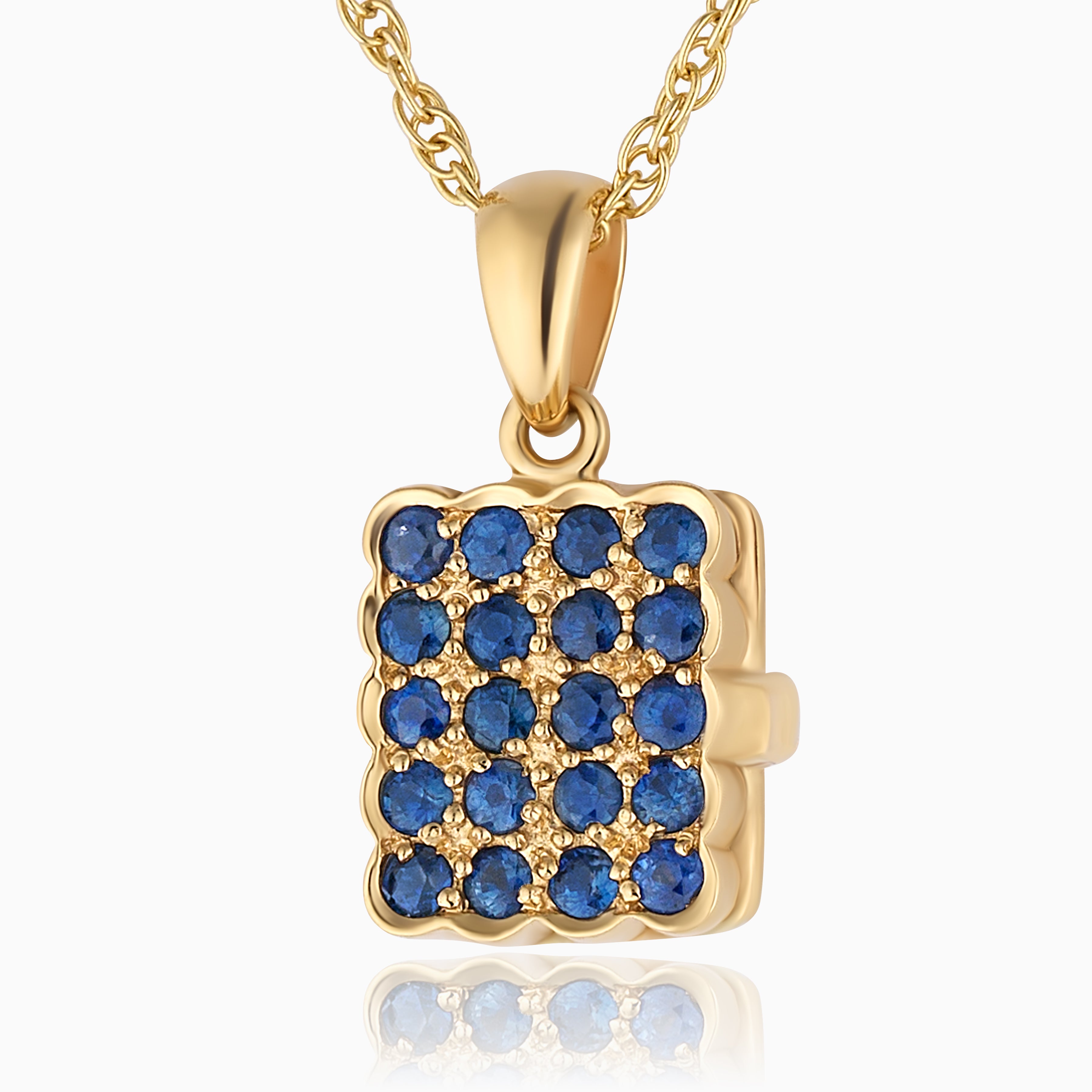 Close up photo of a 9ct gold rectangular locket studded with real sapphires placed on a 9ct gold rope chain.