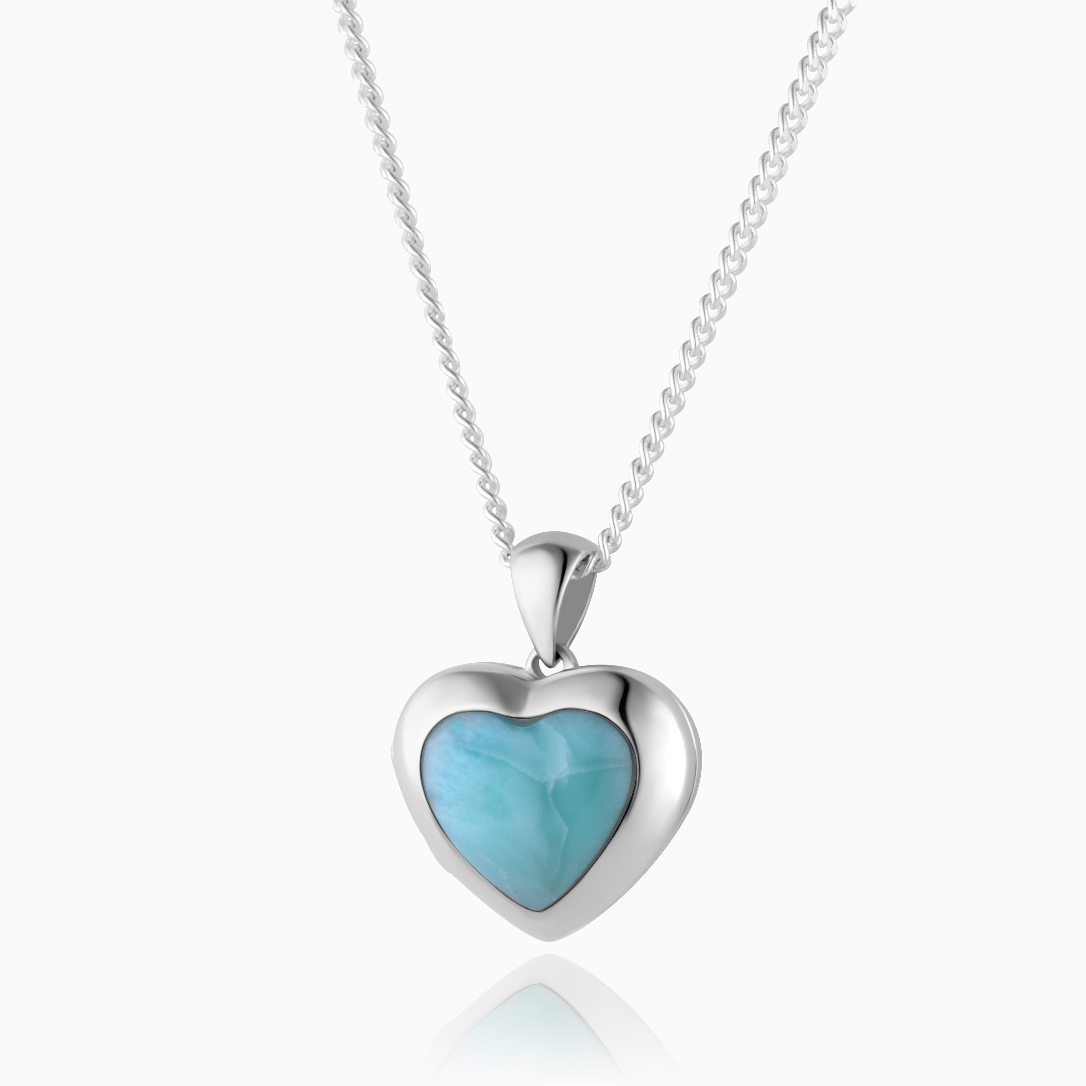 sterling silver heart shaped locket set with blue larimar stone, on a sterling silver curb chain