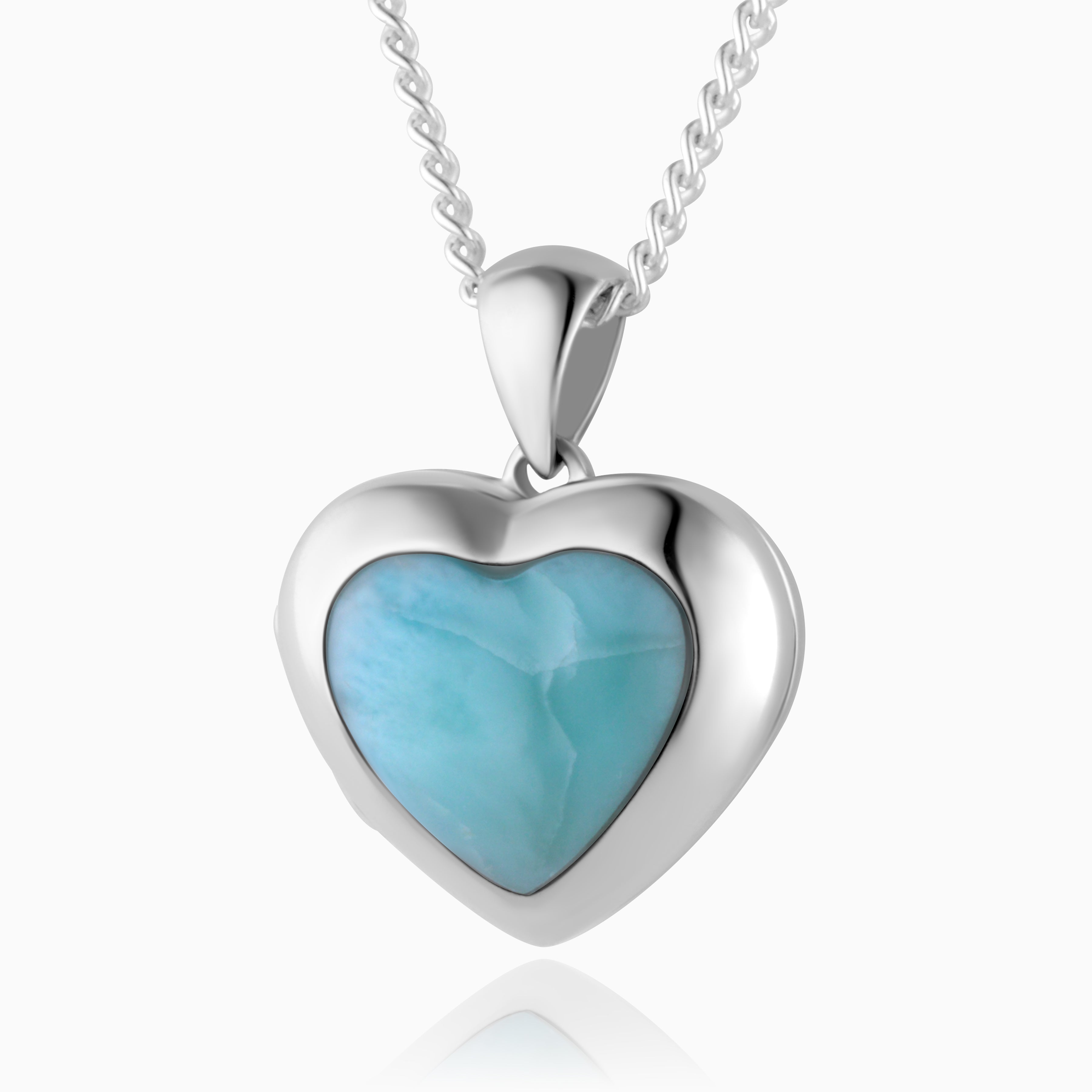 sterling silver heart shaped locket set with blue larimar stone, on a sterling silver curb chain