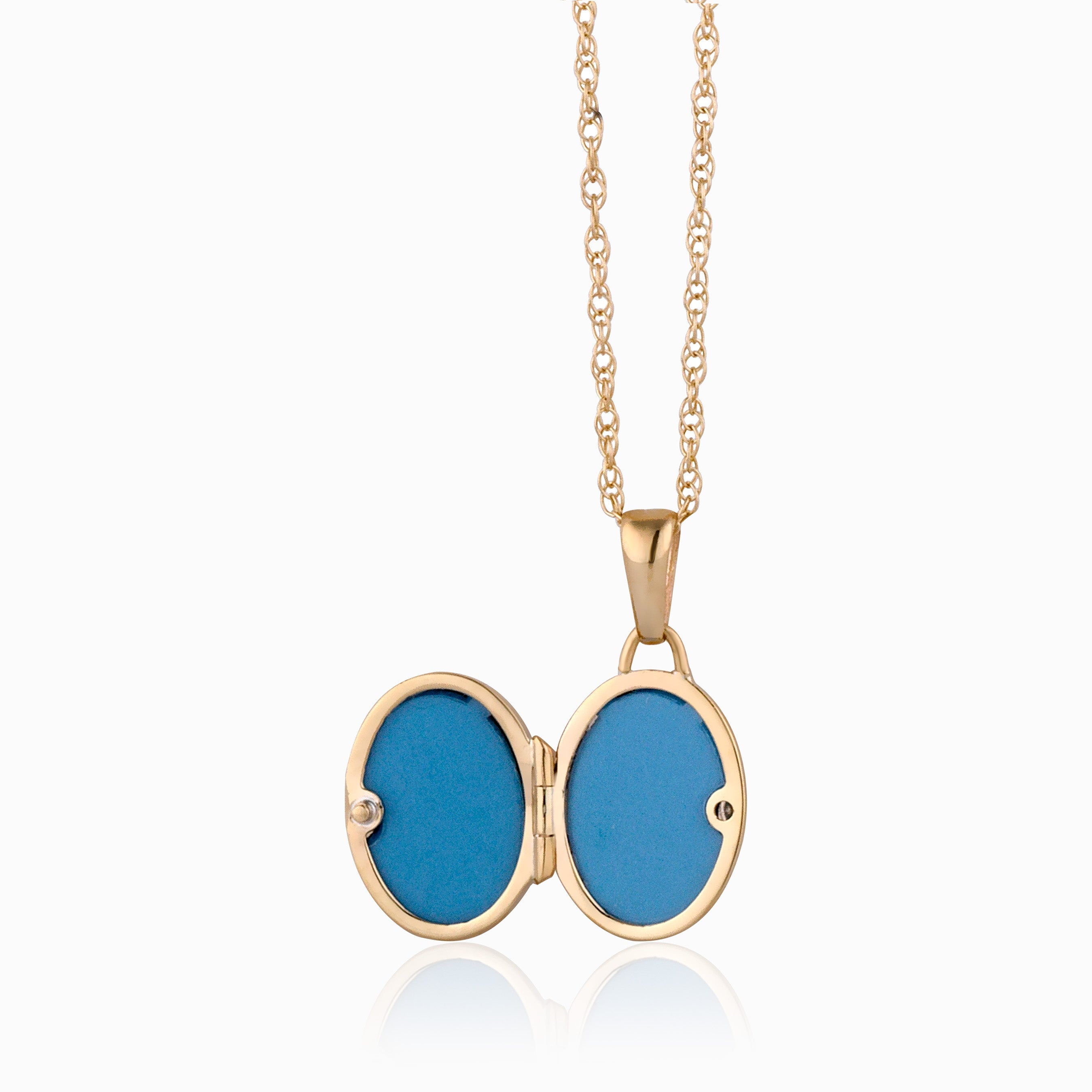 Product title: Tiny Blue Topaz Gold Locket, product type: Locket