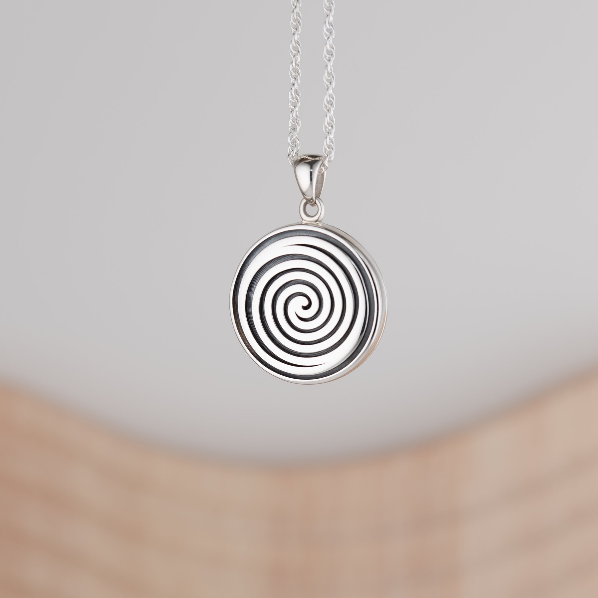 Product title: Round Black and Silver Spiral Locket, product type: Locket