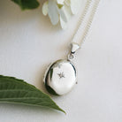Product title: Dainty Silver 4-Photo Diamond Locket, product type: Locket