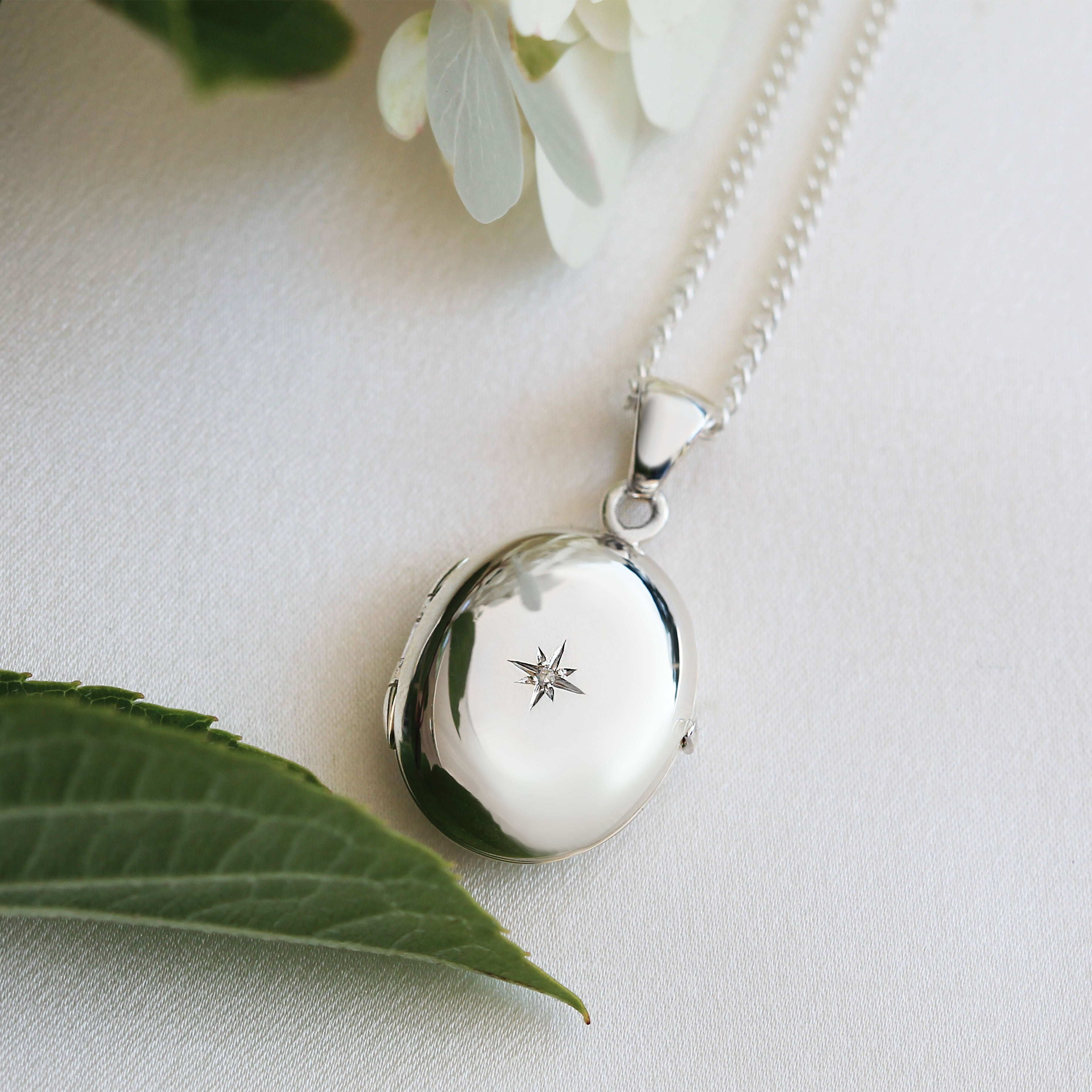 Product title: Dainty Silver 4-Photo Diamond Locket, product type: Locket