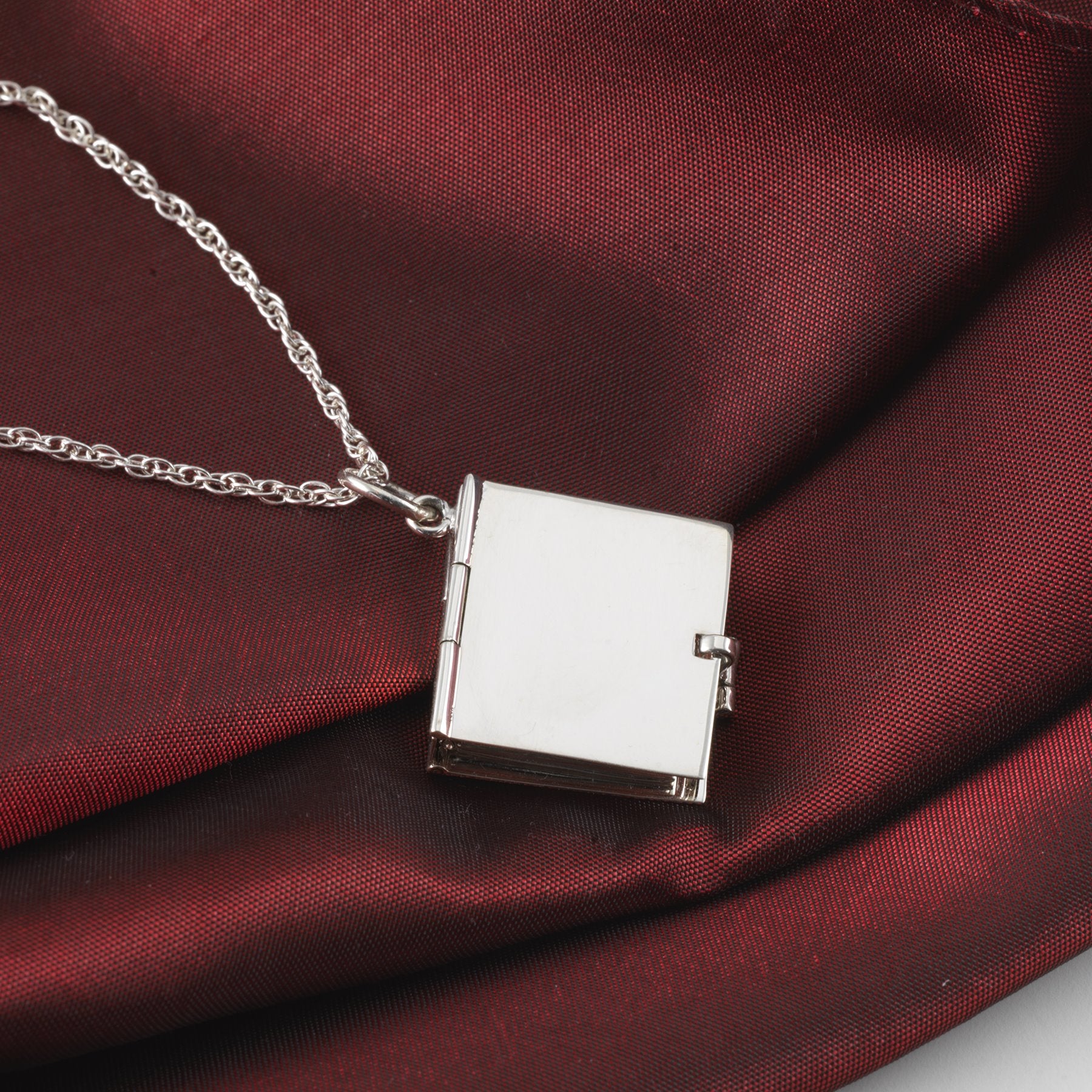 Product title: Plain 10-Photo Book Locket, product type: