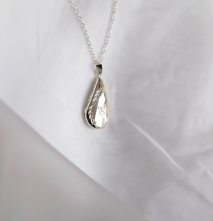 925 sterling silver teardrop locket with engraved bird design