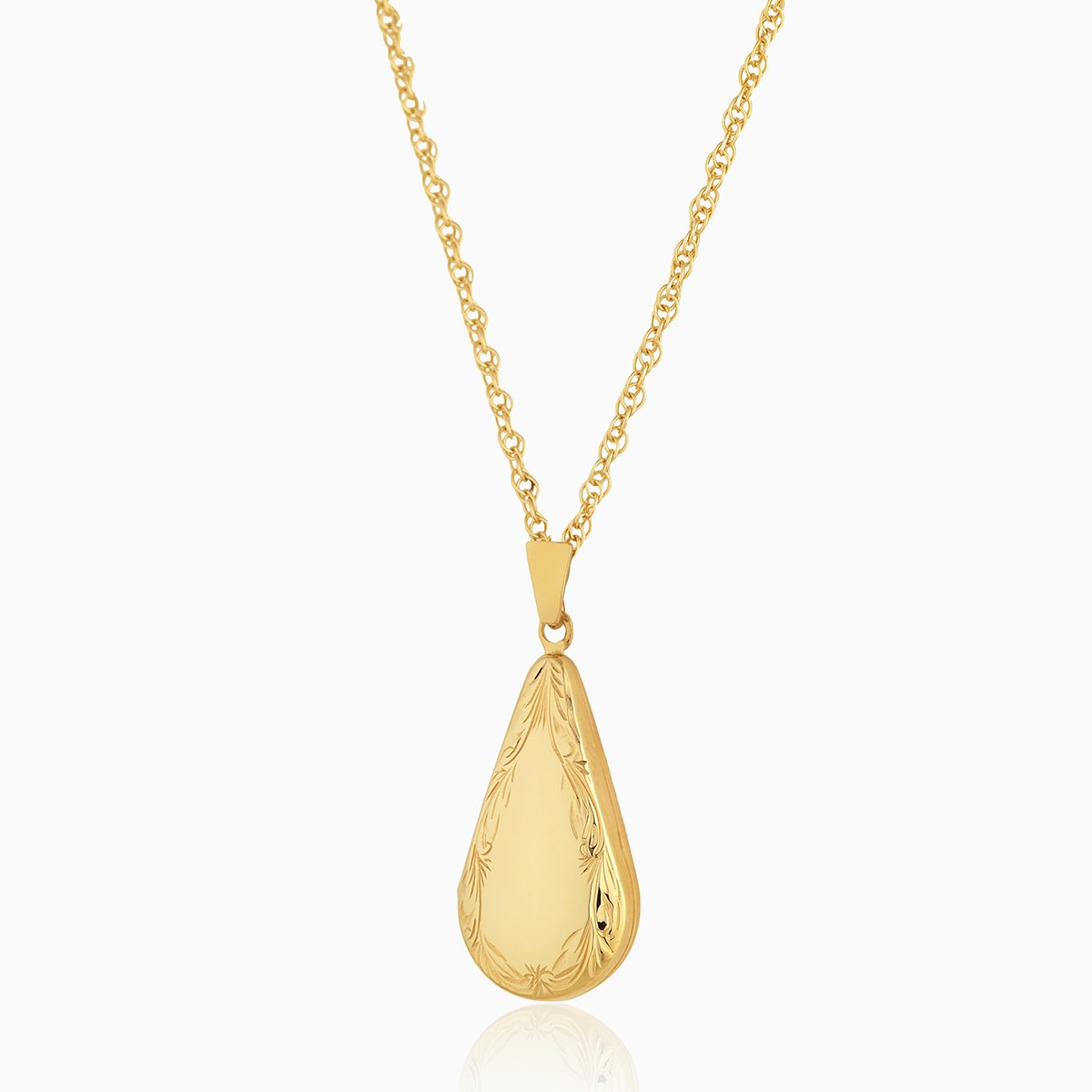 9 ct gold teardrop shaped locket with an engraved border on a 9 ct gold curb chain