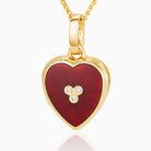 18 ct gold heart locket set with red guilloche enamel and 3 central diamonds on an 18 gold spiga chain