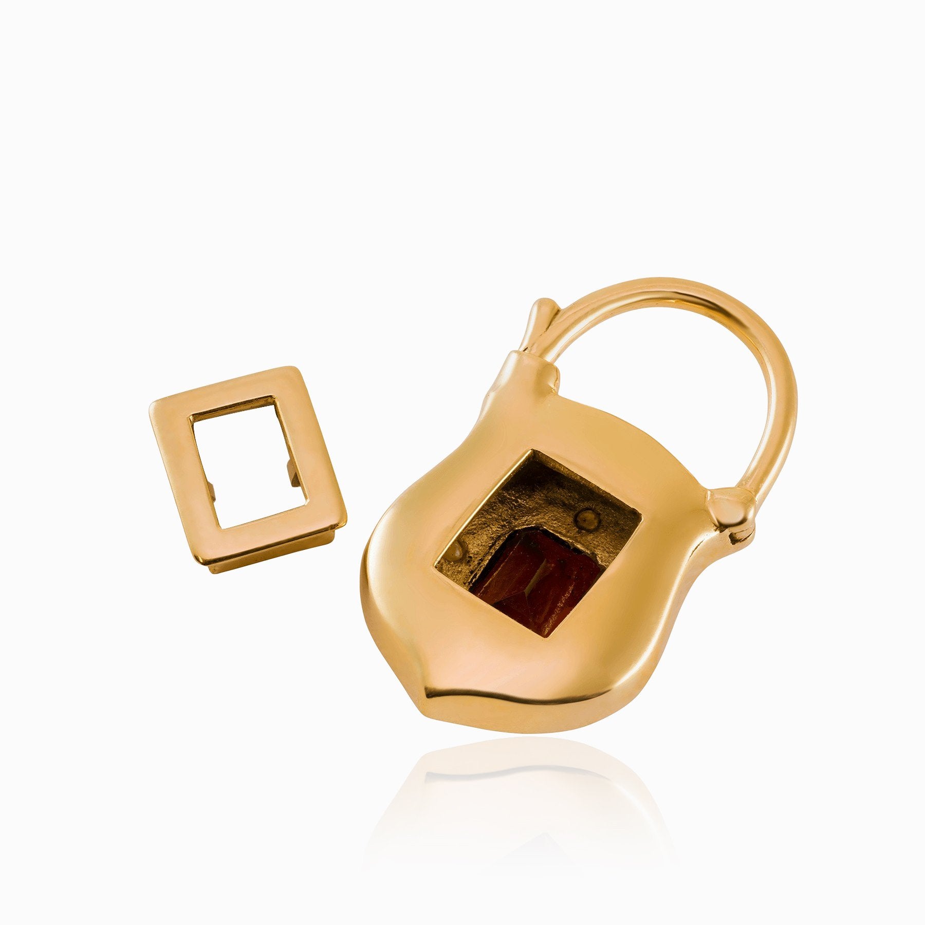Back view of a 9 ct gold padlock locket showing the glass back door