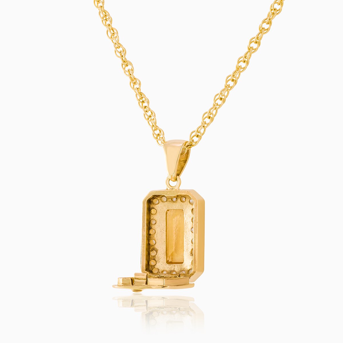 Open view of a 9 ct gold tabular shaped locket on a 9 ct gold rope chain