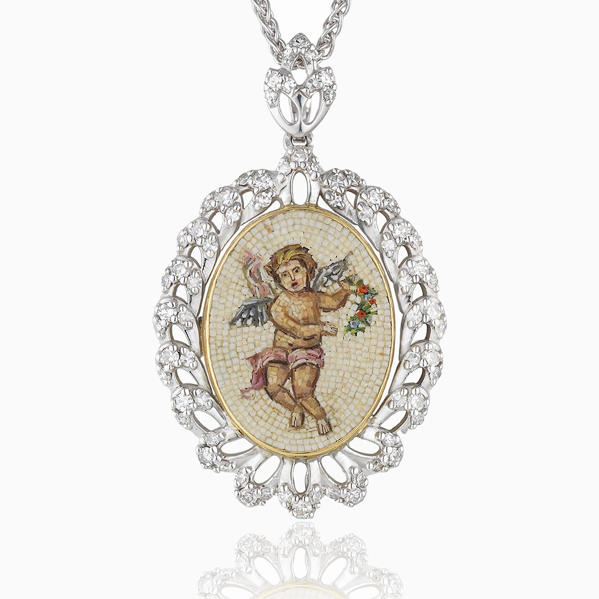 18 ct white gold locket with a micromosaic desing of a cherub with a rope twist surround set with diamonds. The bail is also set with diamonds. On an 18 ct white gold spiga chain.