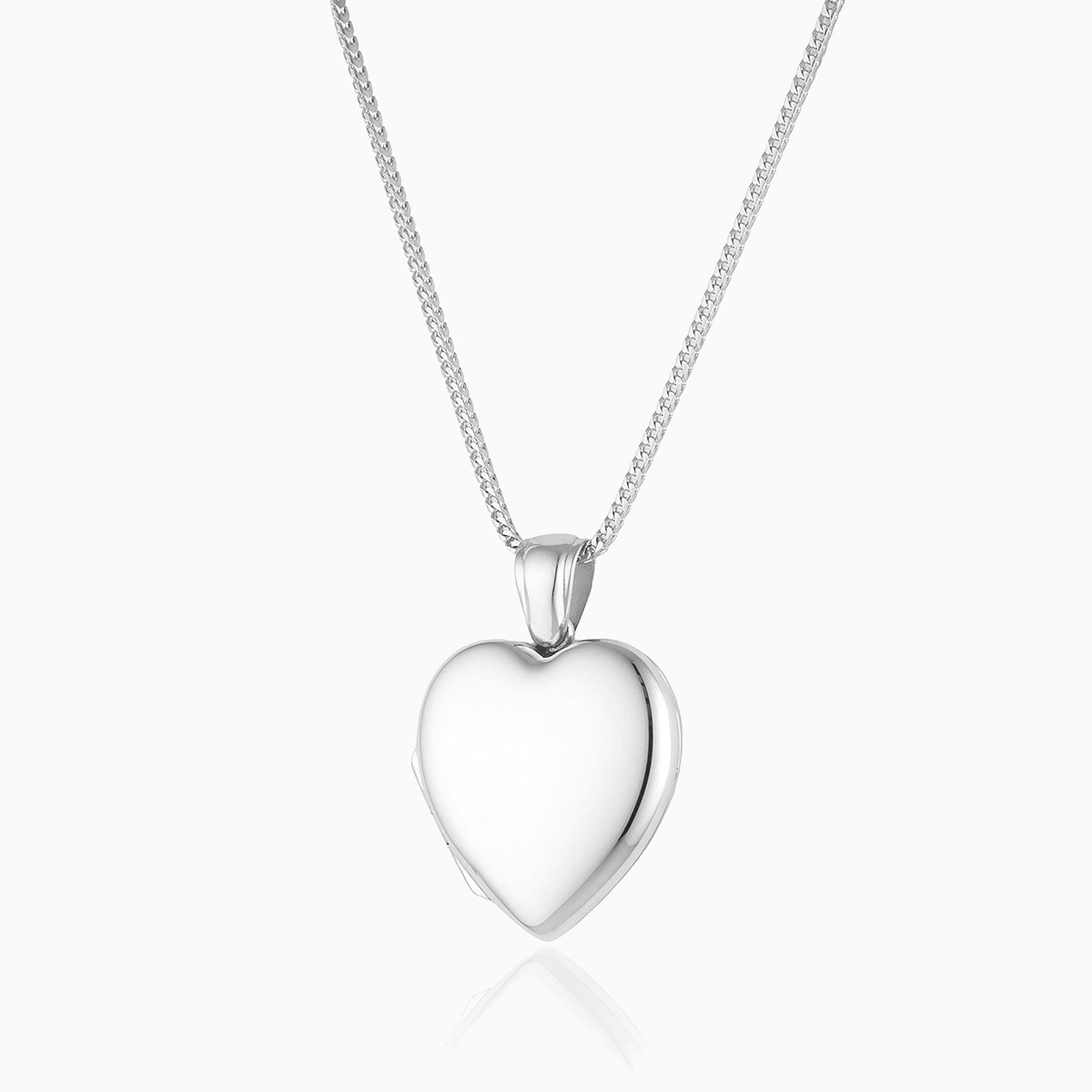 Platinum heart shaped locket on a platinum chain.