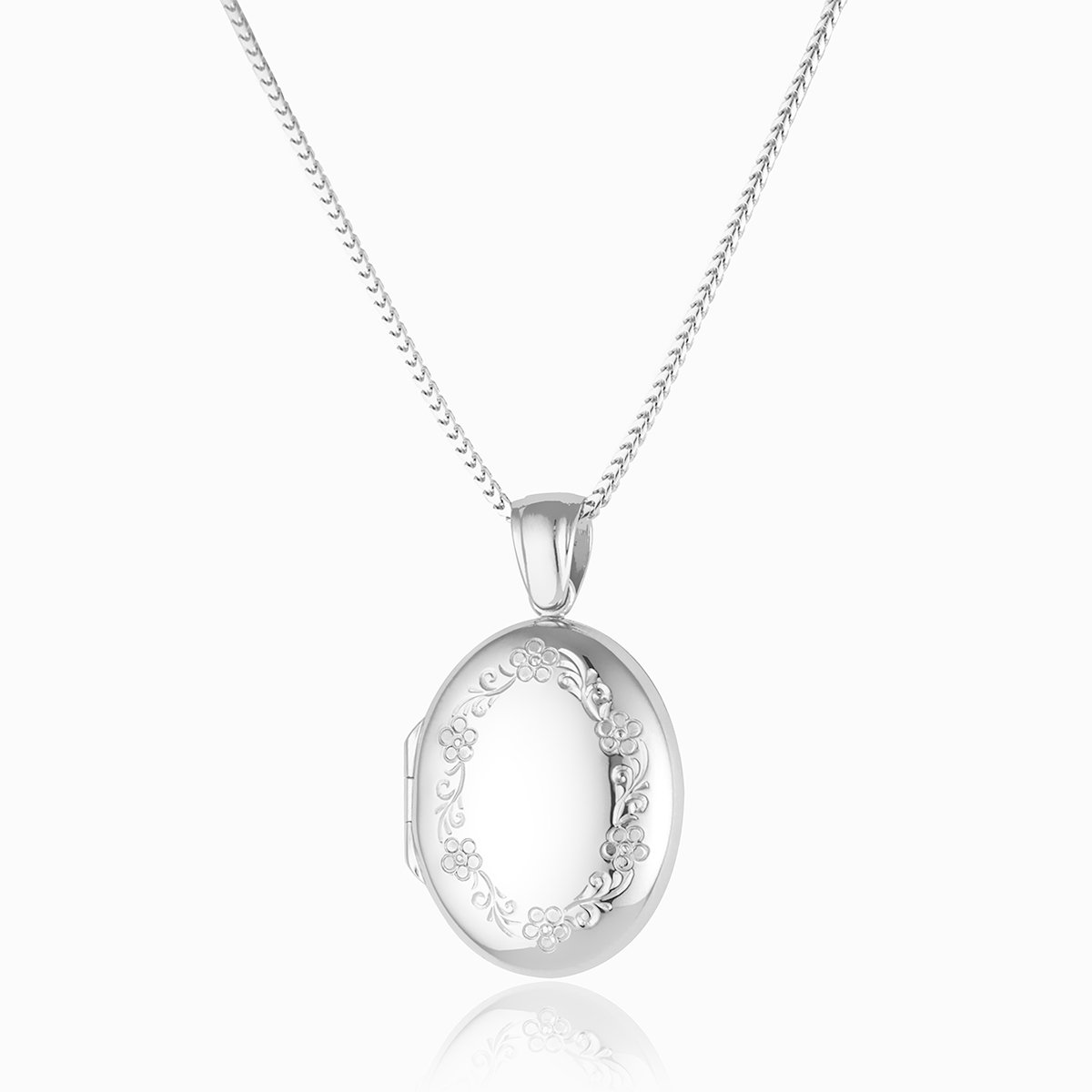 Platinum oval locket engraved with a floral border design on a plattinum chain