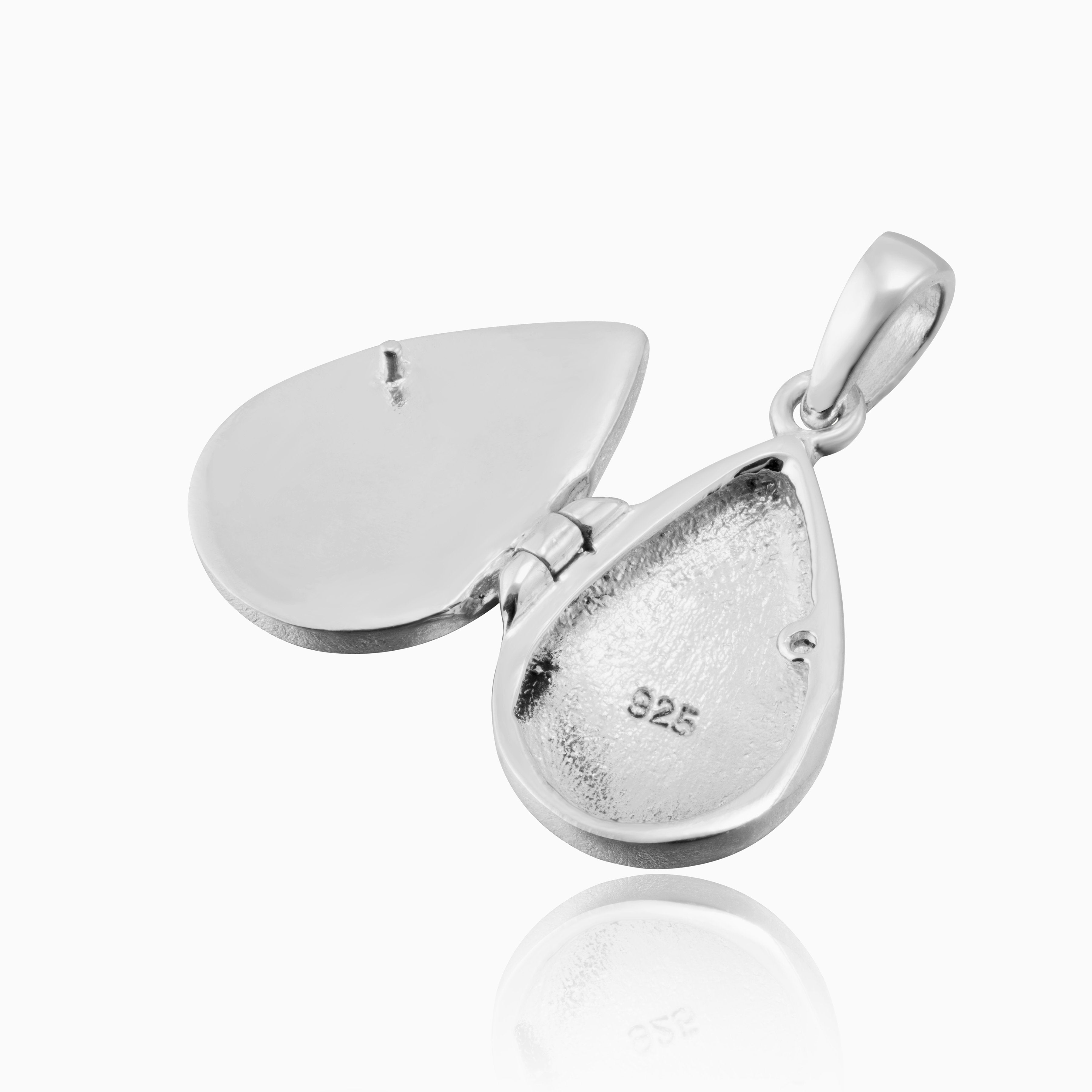 Product title: Coral Teardrop Locket, product type: Locket