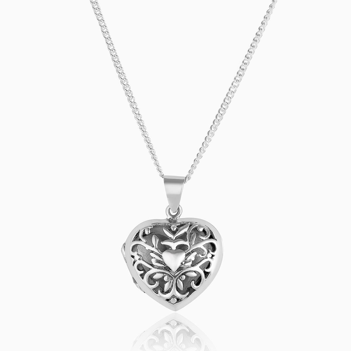 This is a front shot of a 925 sterling silver filigree heart locket.
