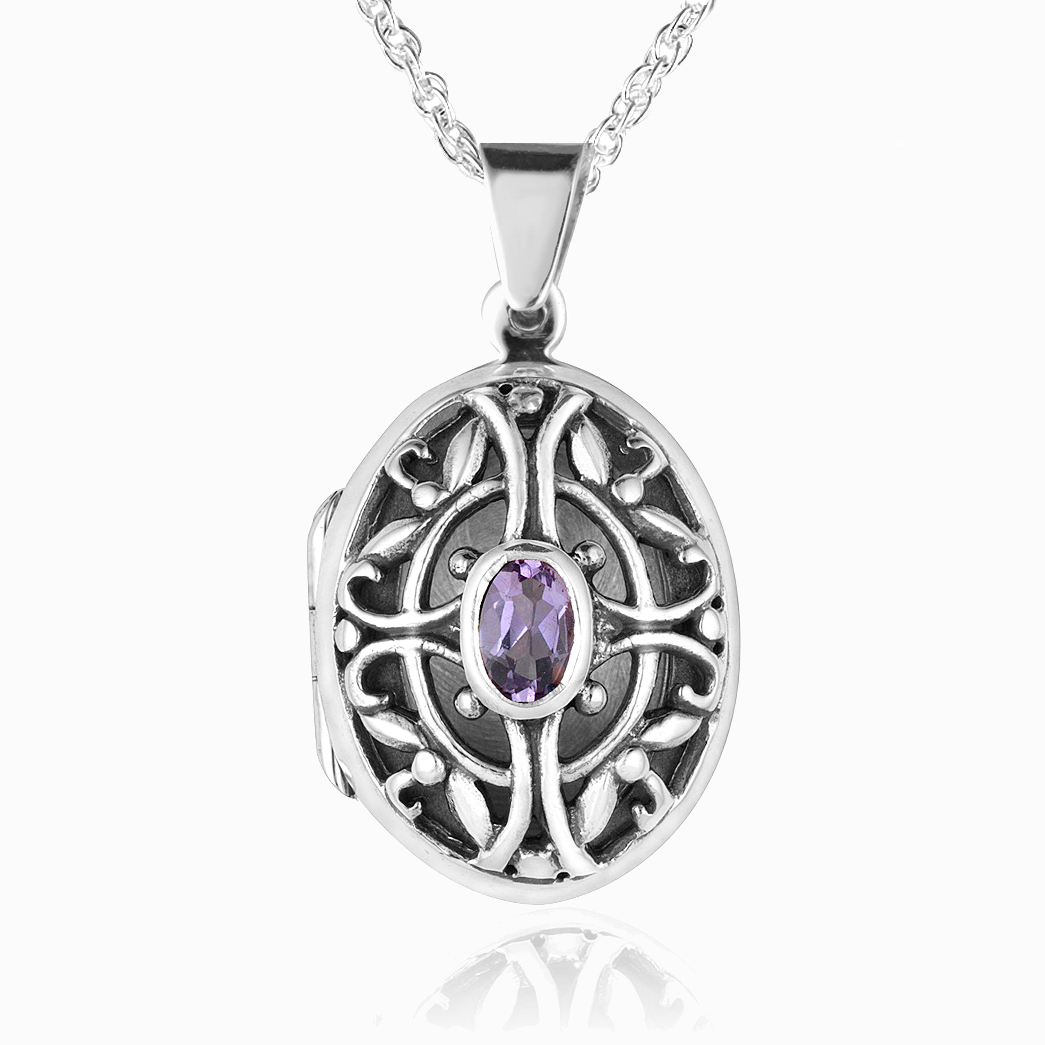sterling silver oval locket with filigree front and a central purple amethyst, on a sterling silver chain