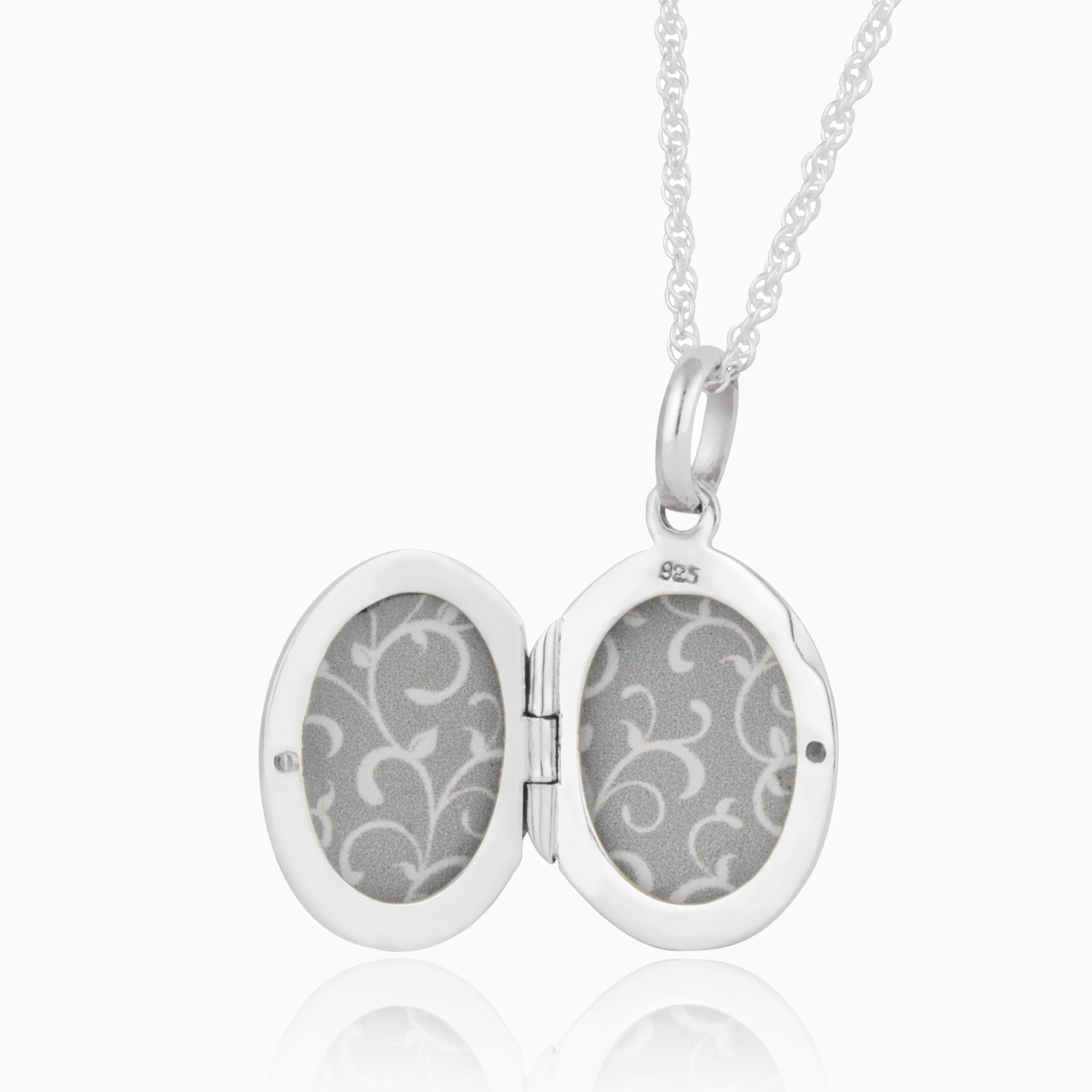 Product title: Silver and Garnet Locket, product type: Locket