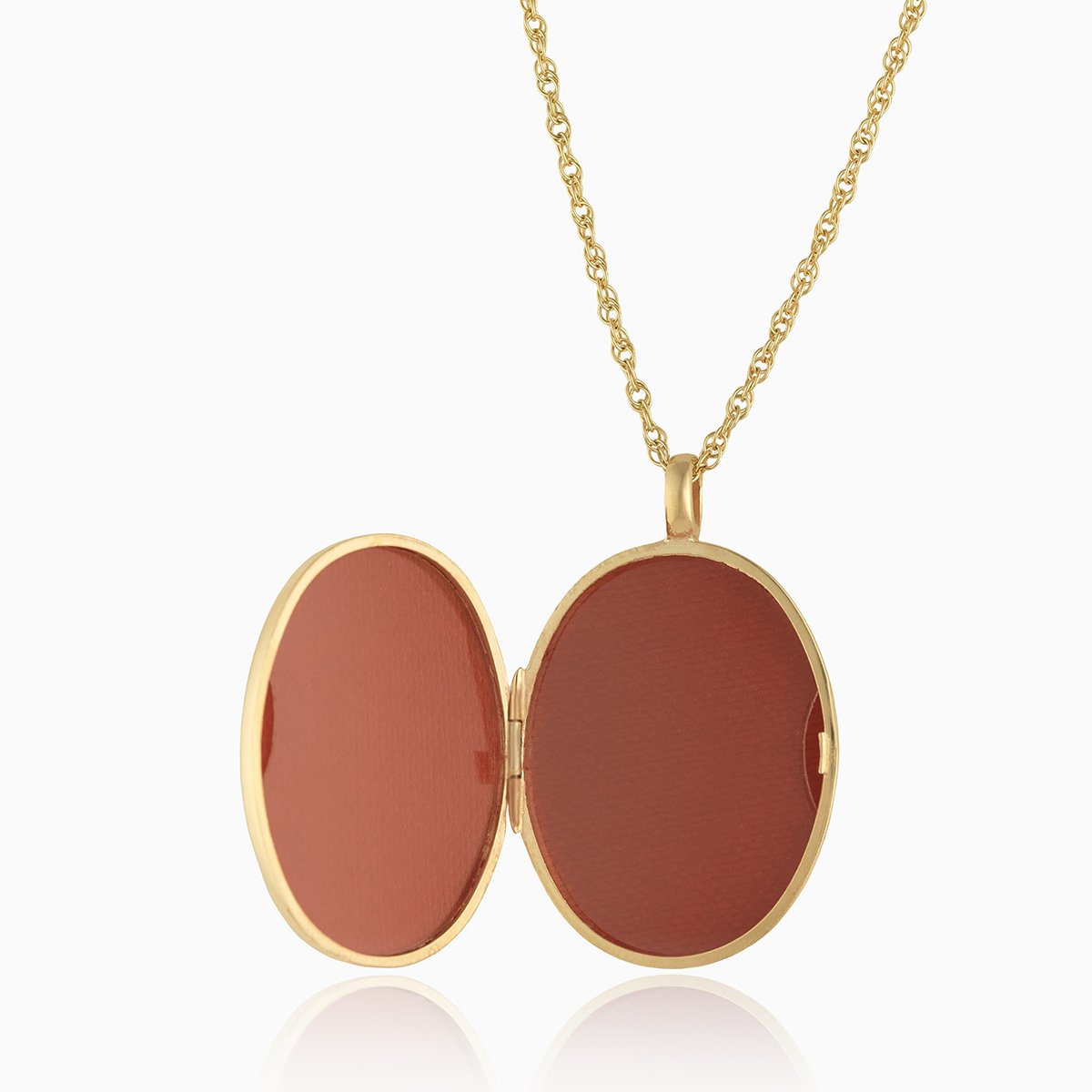 Open view of a large 3-photo 9 ct gold oval locket on a 9 ct gold rope chain