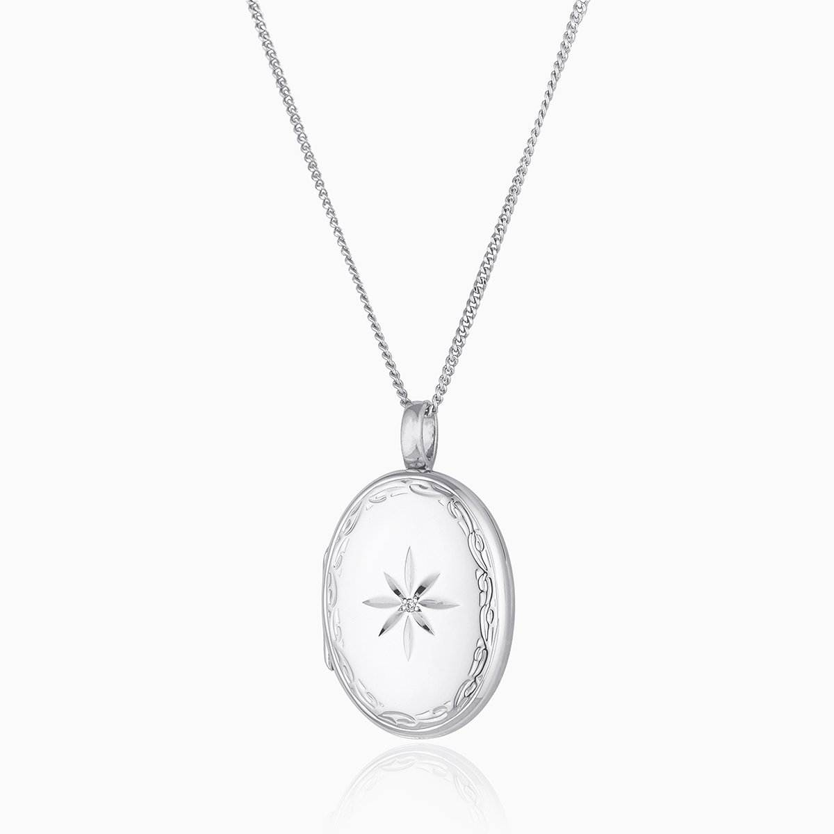 Large oval 9 ct white gold locket star set with a diamond and with an engraved border, on a 9 ct white gold curb chain