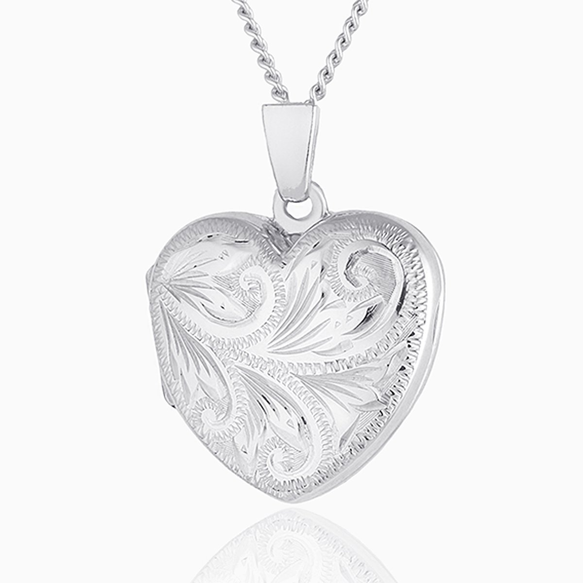 Petite 9 ct white gold heart locket engraved all over with a foliate design, on a 9 ct white gold curb chain