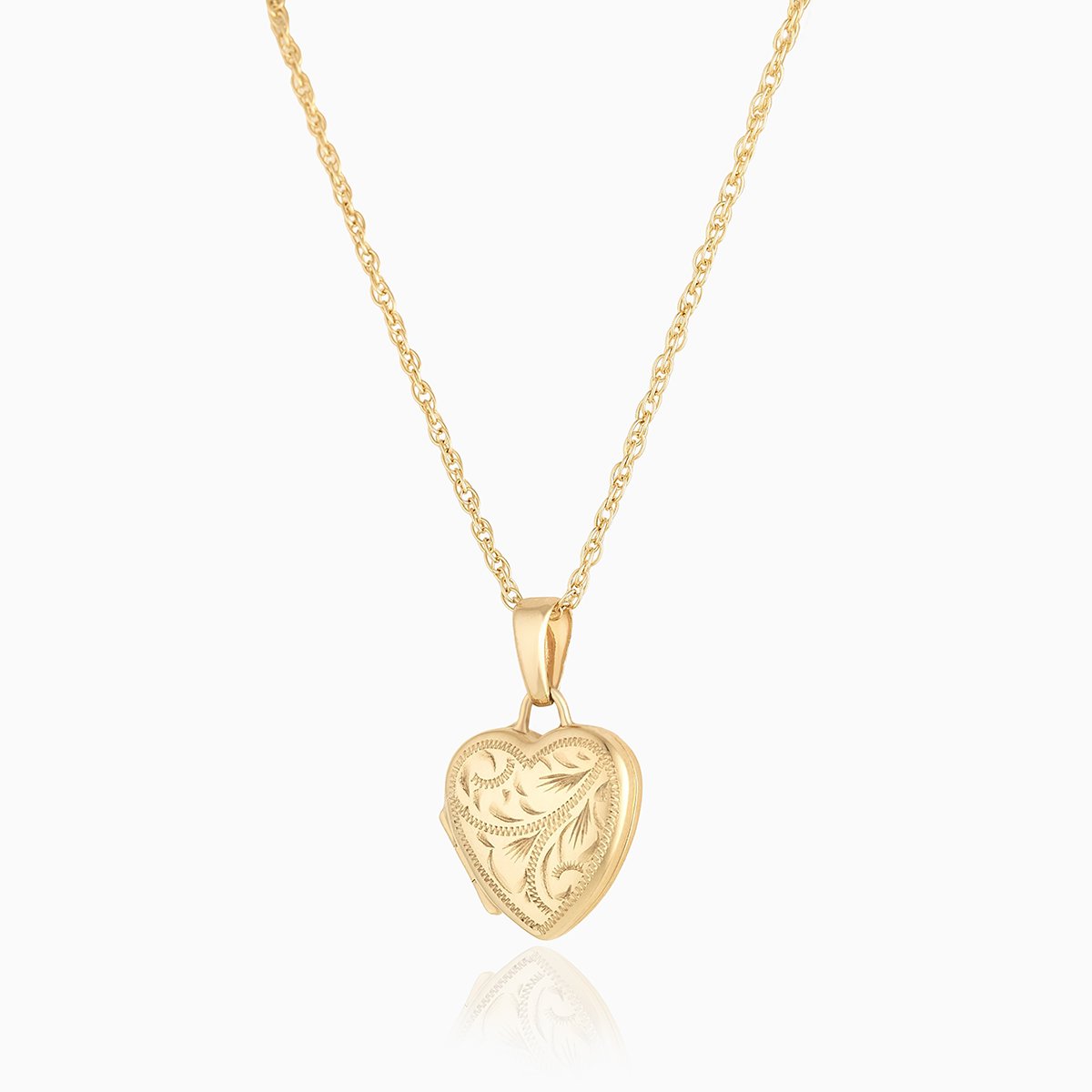 9 ct gold heart shaped locket with all over engraving on a 9 ct gold rope chain