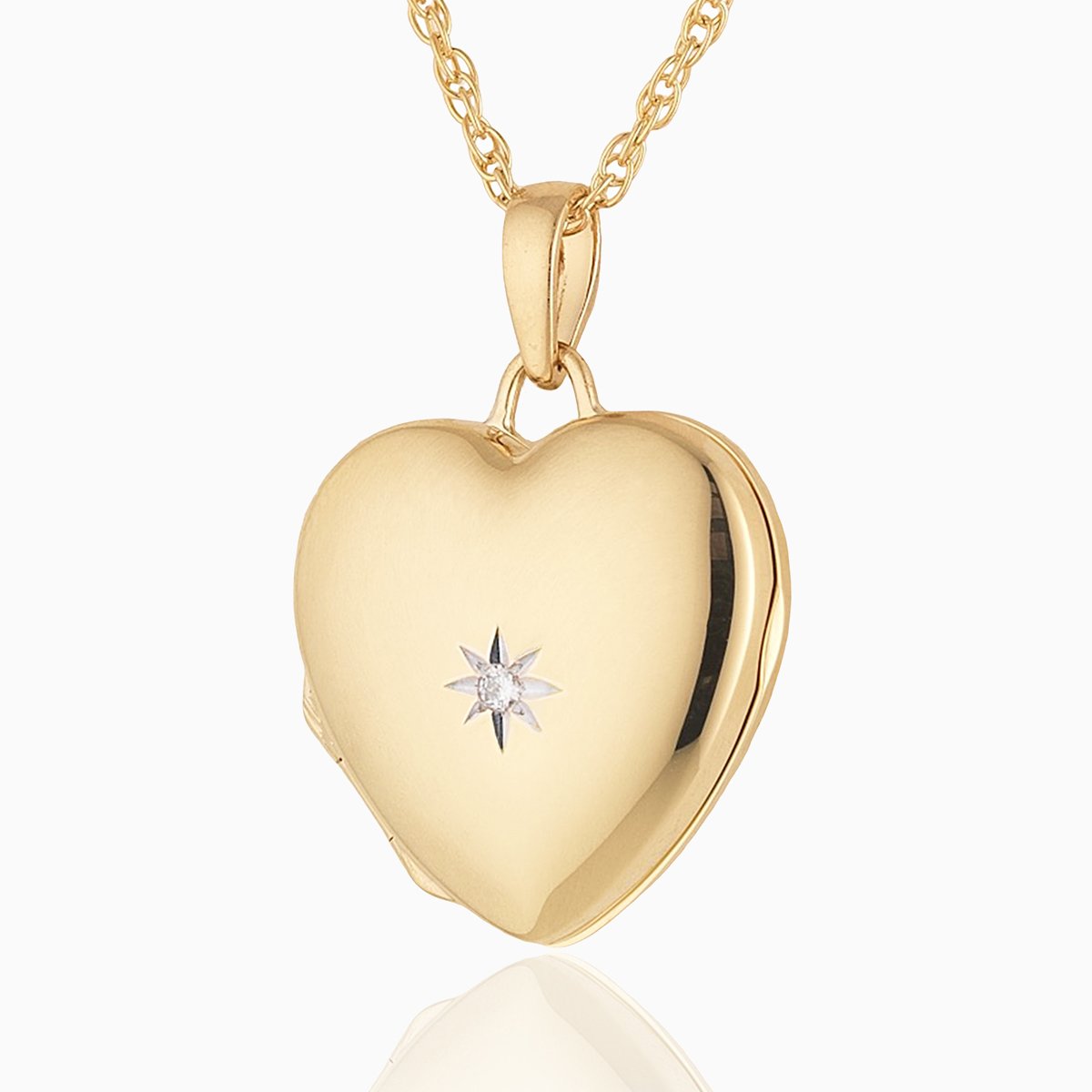 9 ct gold heart locket set with a diamond on a 9 ct gold rope chain.