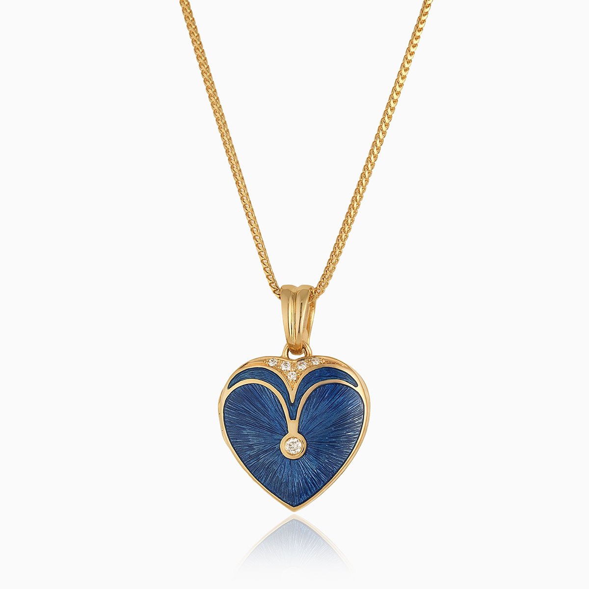 18 ct gold heart locket set with blue guilloche enamel and diamonds on an 18 ct gold franco chain