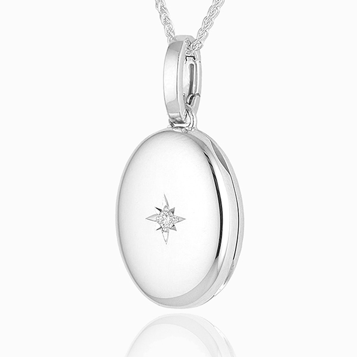 18 ct white gold oval locket star set with a diamond on an 18 ct white gold spiga chain