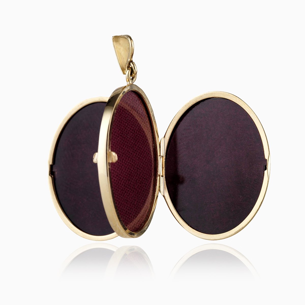 Open view of a large 9 ct gold oval 4-photo polished locket