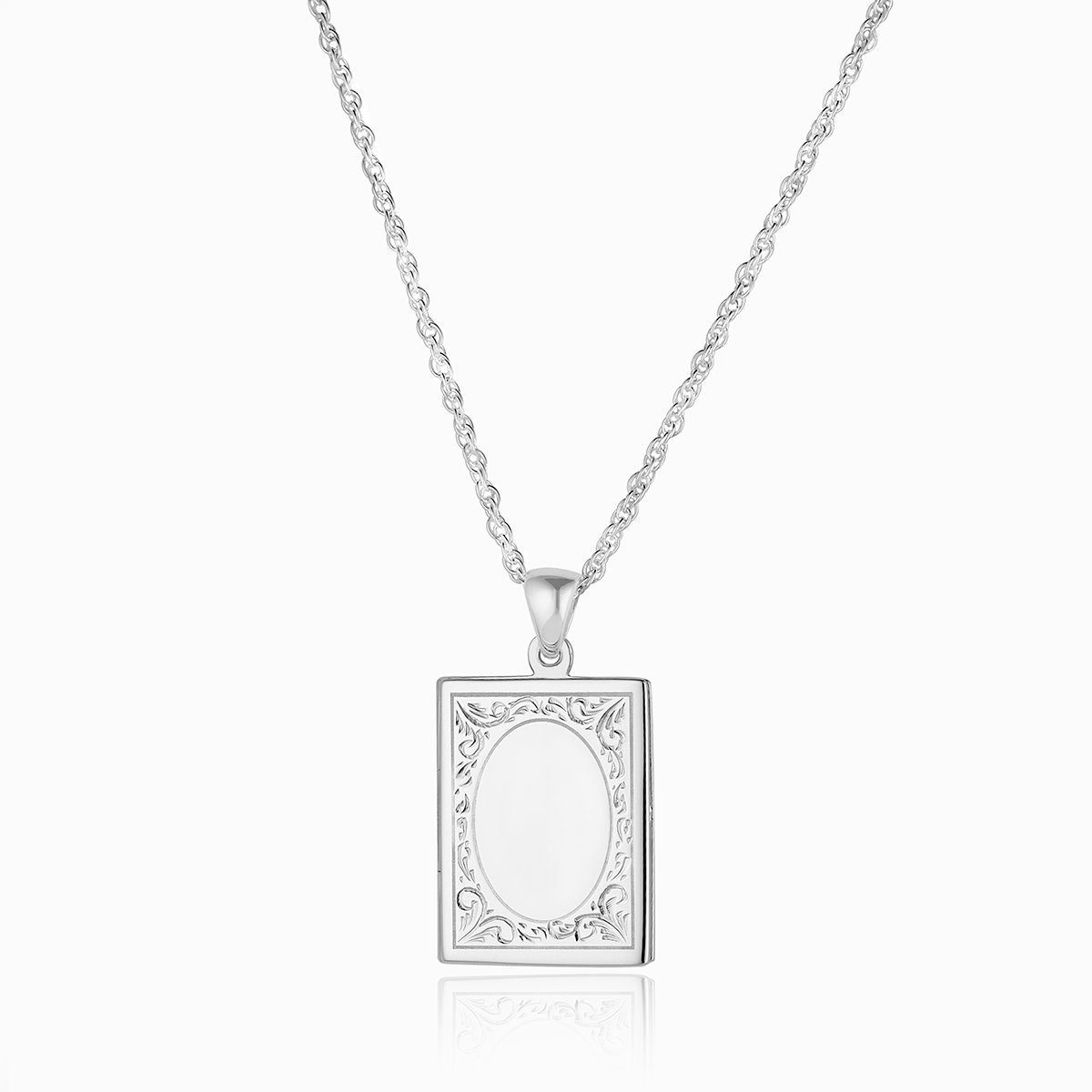 Rectangle sterling silver 925 locket with hand engraved design.