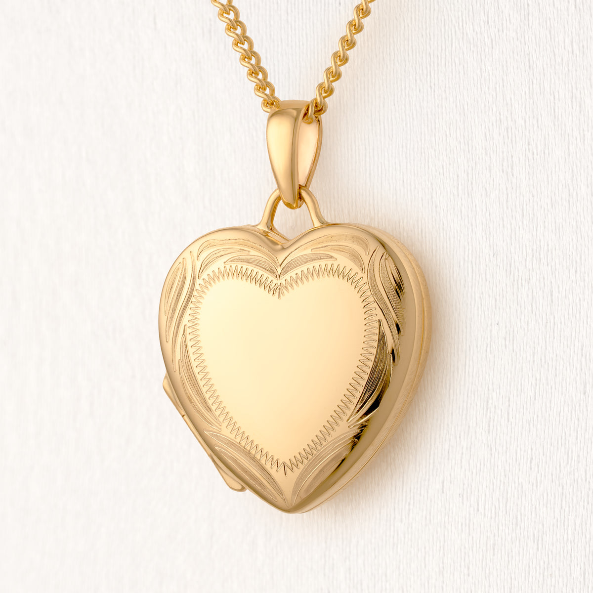 Gold Border Heart Locket