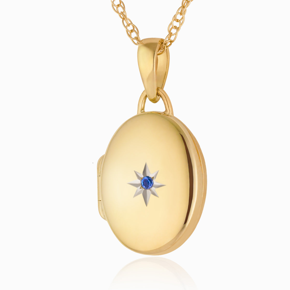 Tiny Gold and Sapphire Locket