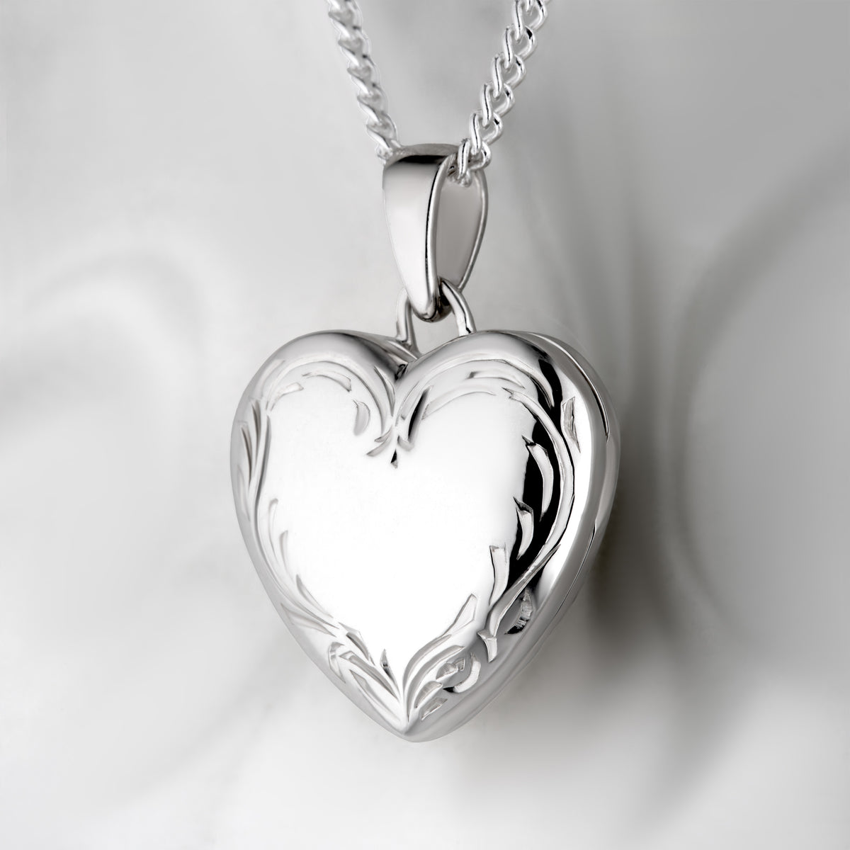 Hand Engraved Border Silver Locket
