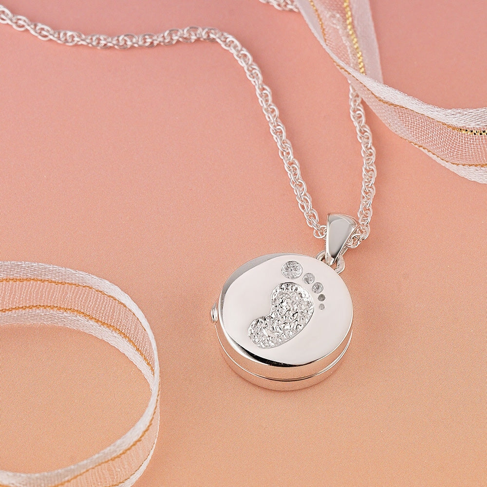 Product title: Tiny Baby Footprint Locket, product type: Locket