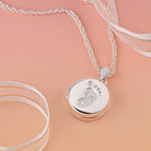 Product title: Tiny Baby Footprint Locket, product type: Locket