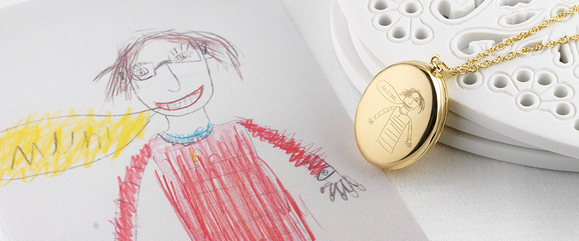 A child’s drawing reproduced on a locket