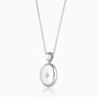 Product title: 18 ct Petite White Gold Oval Diamond Locket, product type: Locket