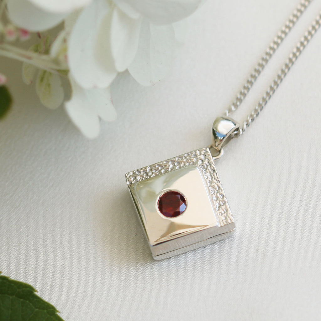 Product title: Contemporary Garnet Tipped Locket, product type: Locket