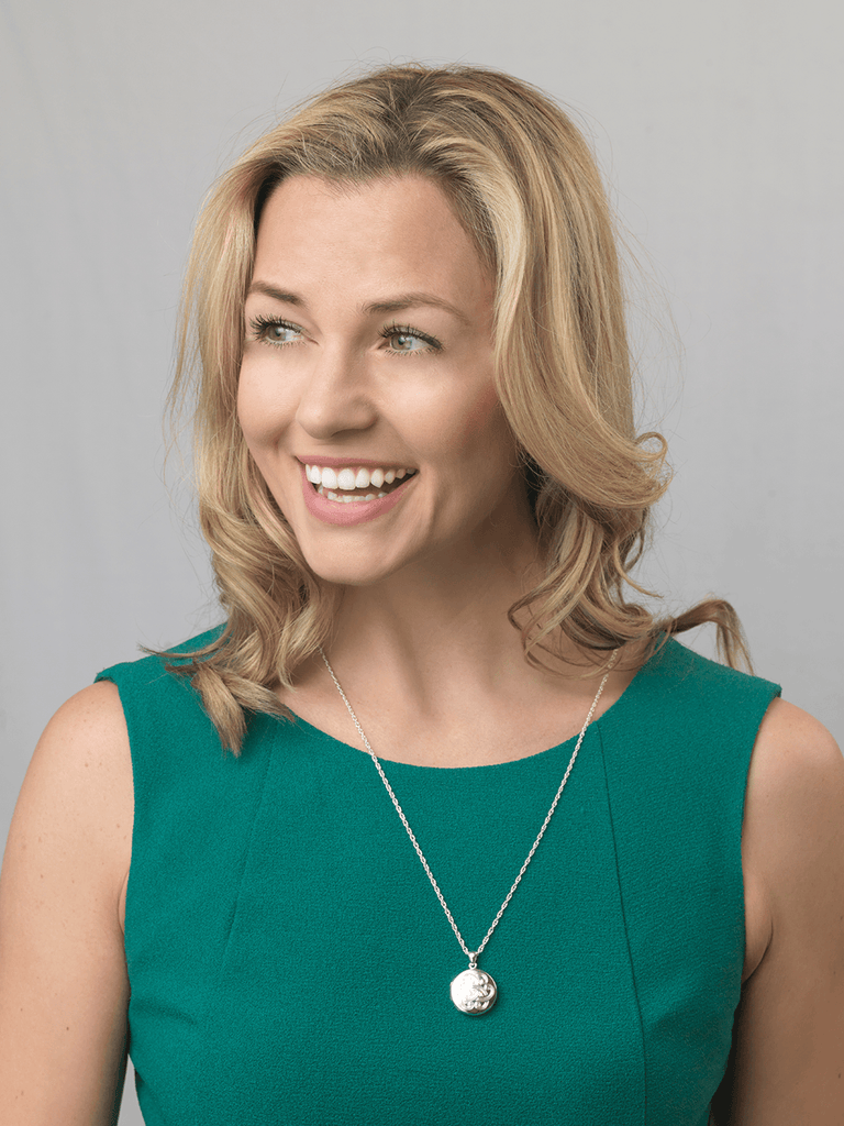 Model wearing 925 Sterling Silver locket, with celtic engraving, shown with rope chain