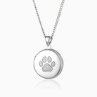 sterling silver round locket with a paw print design engraved on the front, on a sterling silver curb chain