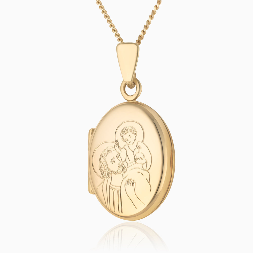 9 ct gold oval locket with an engraving of a st christopher and child, on a 9 ct gold curb chain