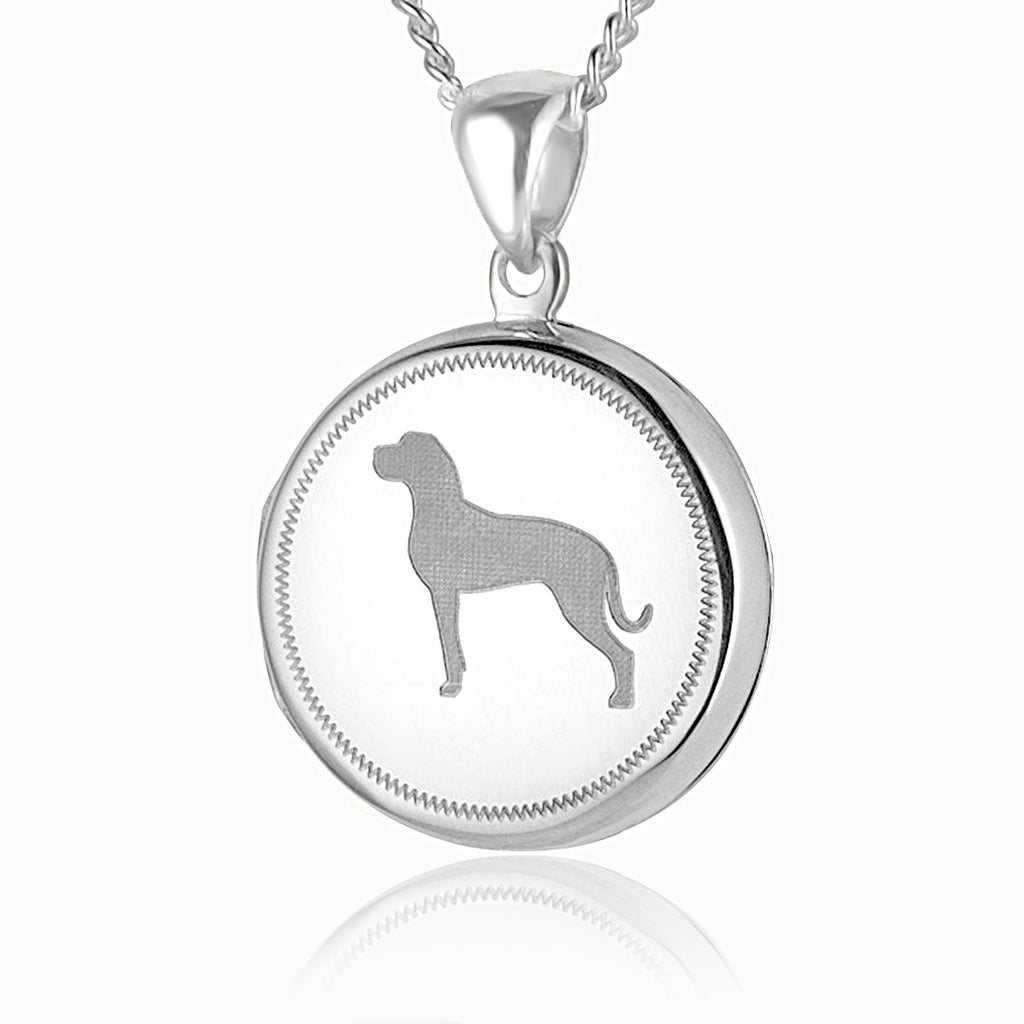 sterling silver round locket with an engraved large breed dog on the front, on a sterling silver curb chain