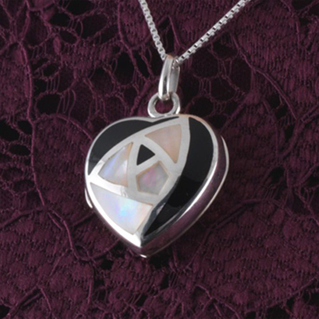 Sterling silver heart shaped locket set with onyx and pink mother of pearl on a sterling silver box chain.