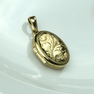 Product title: Gold Oval Engraved Locket 18 mm, product type: Locket