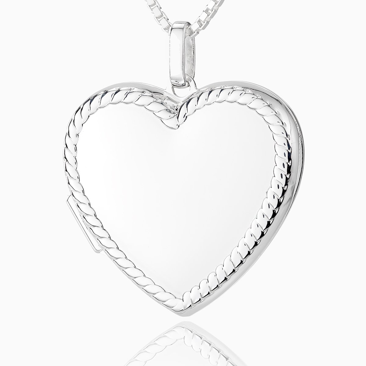 Front shot of a large heart-shaped sterling silver locket with a rope twist border design, set on a serling silver box chain