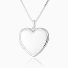 Front shot of a large heart-shaped sterling silver locket with a rope twist border design, set on a sterling silver box chain. 