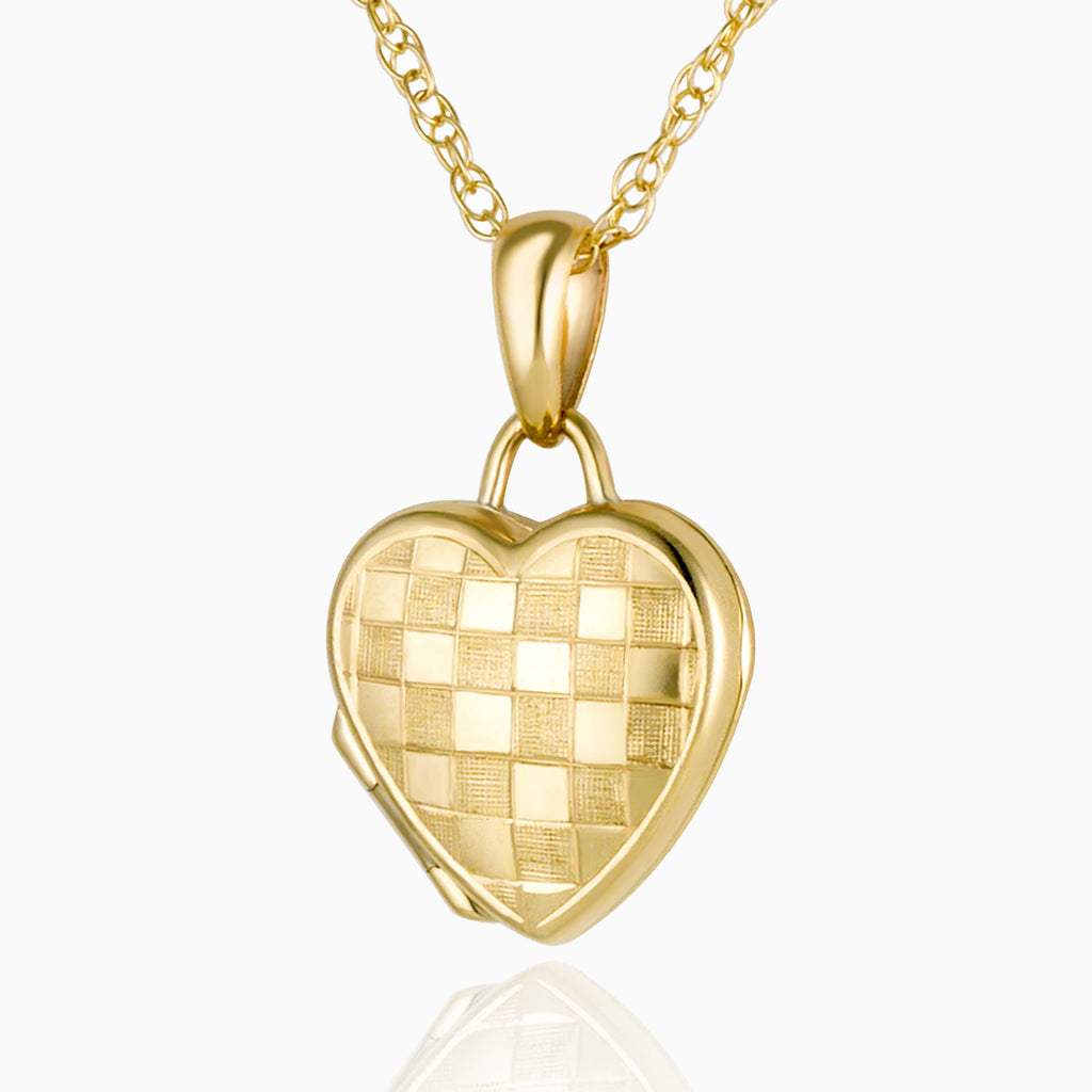 Front shot of a 9 ct heart-shaped petite checkerboard locket set with a 9 ct gold rope chain. 