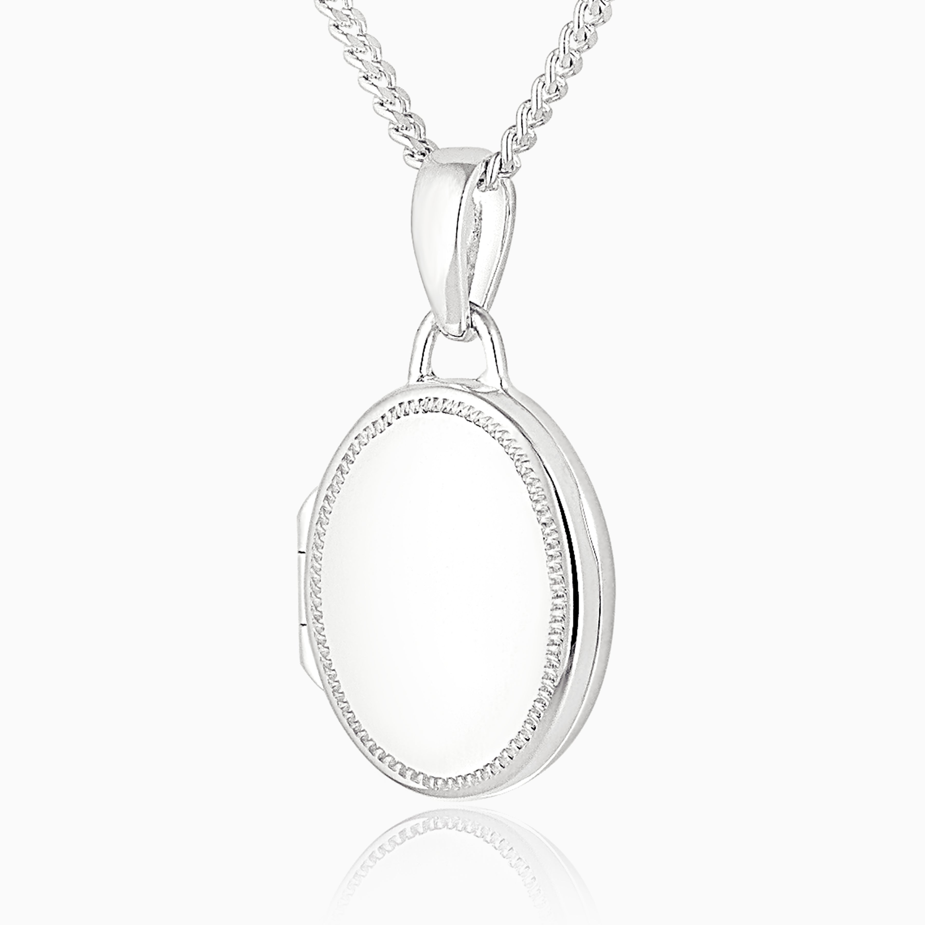 sterling silver oval locket with a riddle-edged engraved border, on sterling silver rope chain